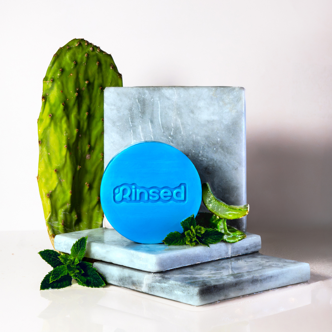 Blue Minty Cactus 3-in-1 bar on marble blocks with a cactus leaf and fresh mint