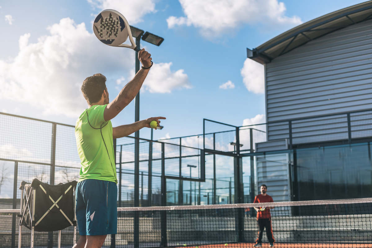 padel player holding racket