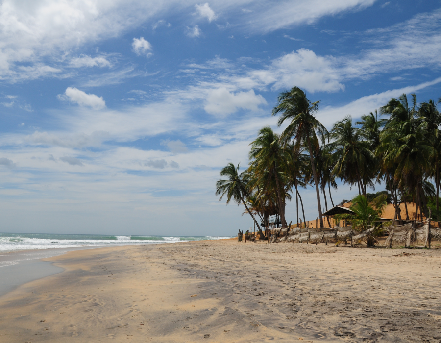 Black sand beach and beach break waves at Canggu in Bali