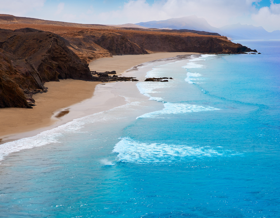Volcanic reef coastline and clean Atlantic waves in the Canary Islands