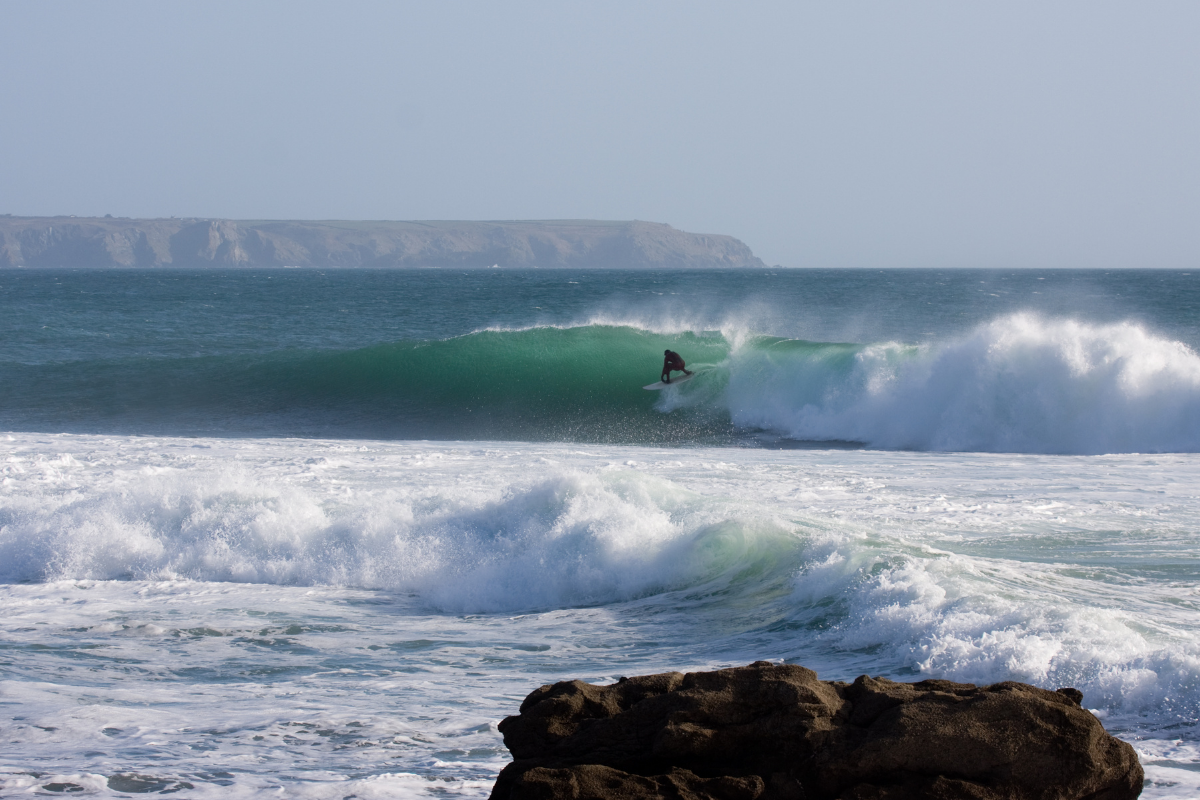 surfer in porthleven