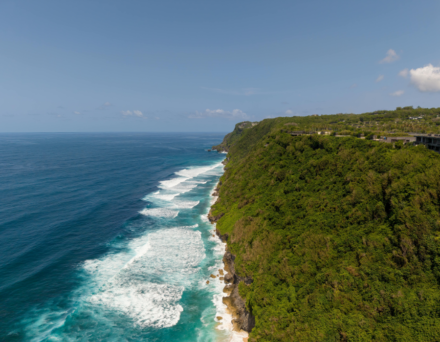 Aerial view of the cliffs and surf at Uluwatu, Bali, a top surf spot in February
