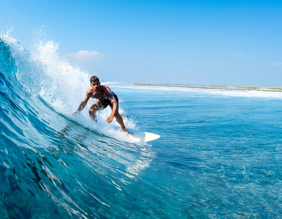 surfer in maldives