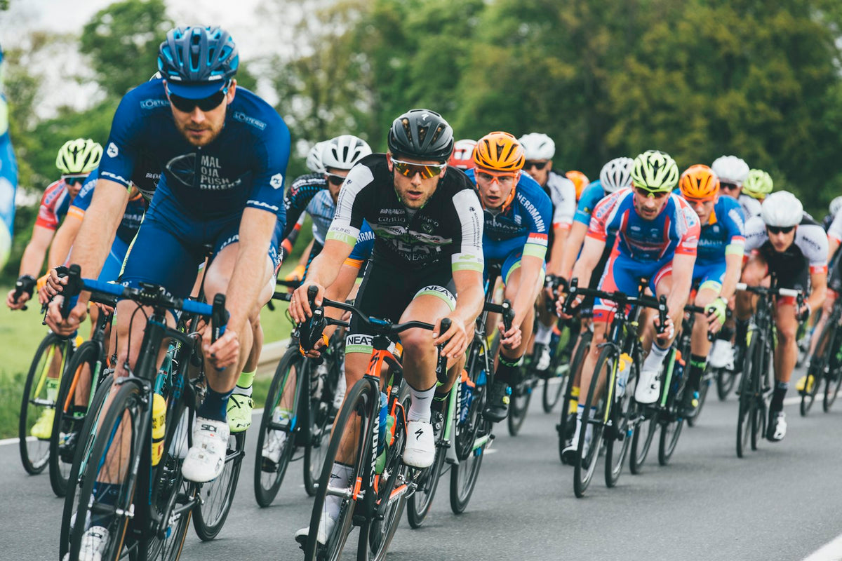 Group of cyclists on an asphalt road
