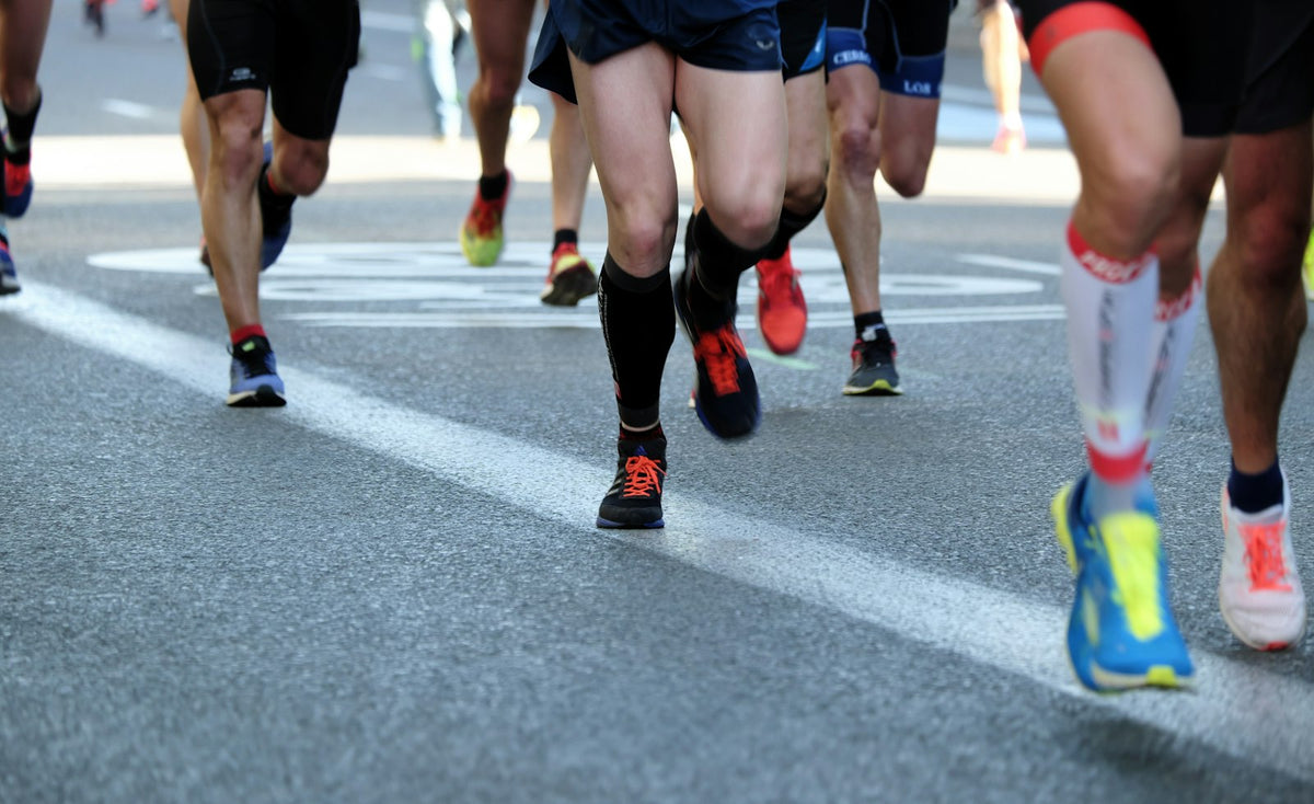 Runners on an asphalt road during a race