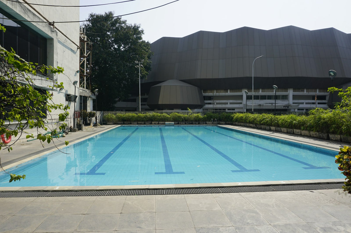 Empty outdoor swimming pool with lane markers