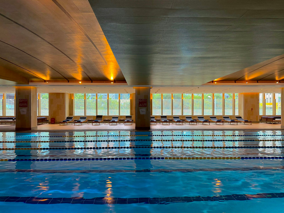 Indoor swimming pool with lanes and natural light
