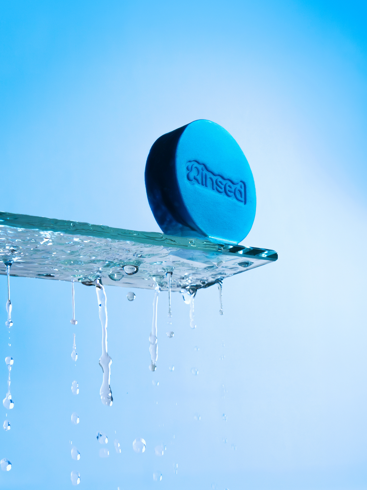 Minty Cactus 3-in-1 bar resting on a shower shelf